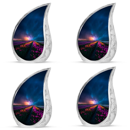 Dusty Blue Garden Tulip Cremation Urn close-up of engraving and surface detail - flowing teardrop garden tulip silhouette on curved aluminum - 10 inch aluminum urn for cremated remains