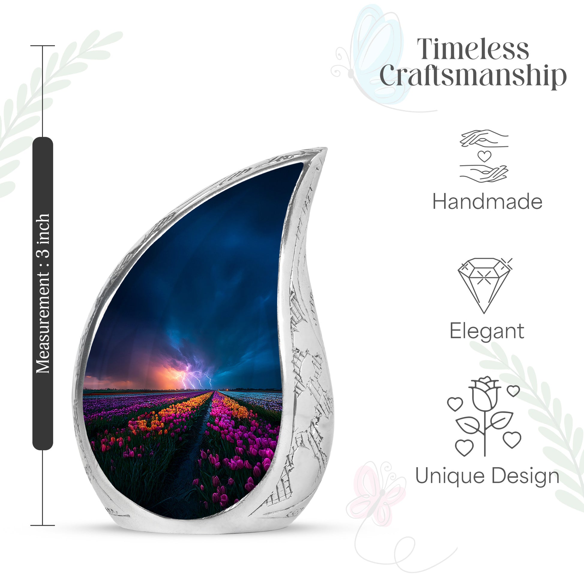 Cobalt Blue Garden Tulip Cremation Urn angled view of lid and engraved motif - smooth teardrop contour featuring garden tulip art - mini keepsake memorial for portion of cremation ashes