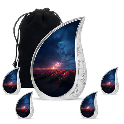 Cobalt Blue Garden Tulip Cremation Urn side profile showing urn shape - smooth teardrop contour featuring garden tulip art - memorial set with one large and four small urns