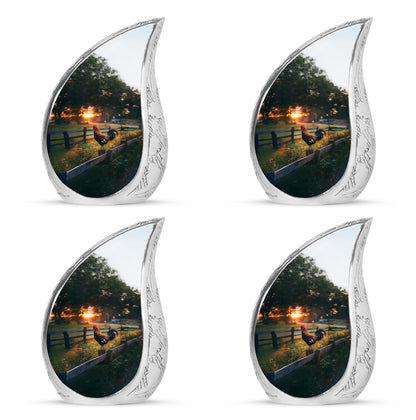 Onyx Black Hen Cremation Urn close-up of engraving and surface detail - graceful tear-shaped urn with hen motif - 10 inch aluminum urn for cremated remains