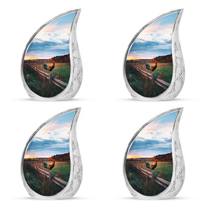 Indigo Hen Cremation Urn close-up of engraving and surface detail - rounded teardrop hen design with delicate detail - 10 inch aluminum urn for cremated remains