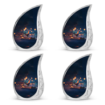Pastel Blue Hen Cremation Urn close-up of engraving and surface detail - flowing teardrop hen silhouette on curved aluminum - 10 inch aluminum urn for cremated remains