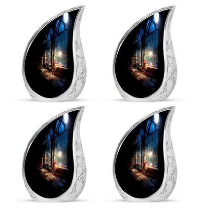 Onyx Black Hen Cremation Urn close-up of engraving and surface detail - graceful tear-shaped urn with hen motif - 10 inch aluminum urn for cremated remains