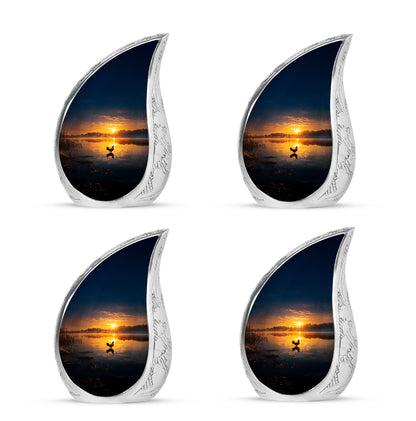 Onyx Black Hen Cremation Urn close-up of engraving and surface detail - graceful tear-shaped urn with hen motif - 10 inch aluminum urn for cremated remains