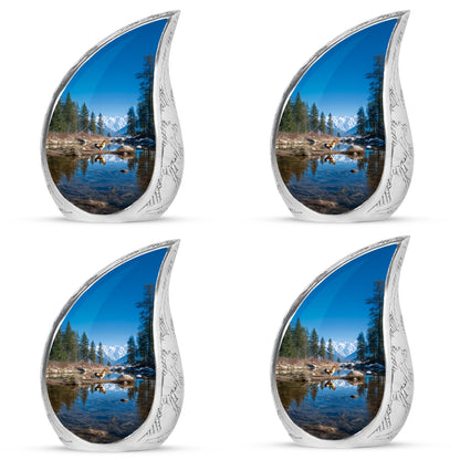 Vivid Blue Hen Cremation Urn close-up of engraving and surface detail - graceful tear-shaped urn with hen motif - 10 inch aluminum urn for cremated remains