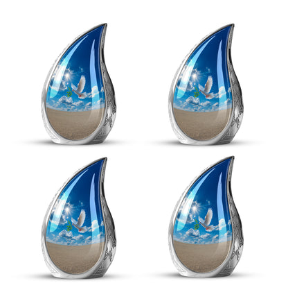 Calming Blue Dove Cremation Urn close-up of engraving and surface detail - graceful tear-shaped urn with dove motif - 10 inch aluminum urn for cremated remains
