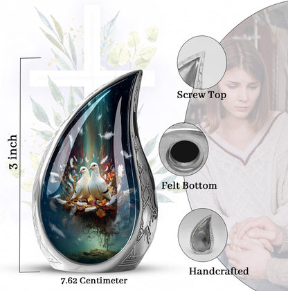 Obsidian Black Dove Cremation Urn angled view of lid and engraved motif - graceful tear-shaped urn with dove motif - mini keepsake memorial for portion of cremation ashes
