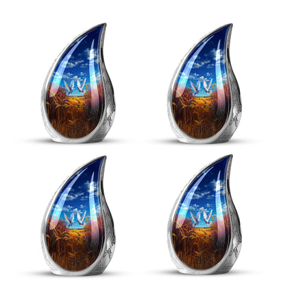 Vivid Blue Dove Cremation Urn close-up of engraving and surface detail - graceful tear-shaped urn with dove motif - 10 inch aluminum urn for cremated remains