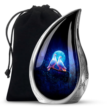 Powder Blue Dove Cremation Urn front view showing detailed design - flowing teardrop dove silhouette on curved aluminum - full-size 10 inch 200 cubic inch adult cremation urn