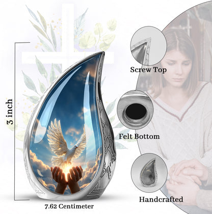 Cornflower Blue Dove Cremation Urn angled view of lid and engraved motif - smooth teardrop contour featuring dove art - mini keepsake memorial for portion of cremation ashes