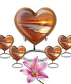  heart-shaped beach urn adorned with flowers, 