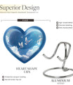Heart-shaped, floral themed dove urn made of aluminium for funeral ashes