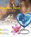 Heart-shaped, floral themed dove urn made of aluminium for funeral ashes