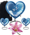 Heart-shaped, floral themed dove urn made of aluminium for funeral ashes