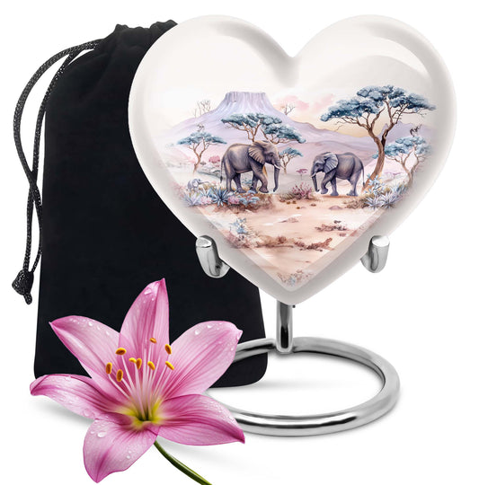 10-inch Heart-shaped Elephant Urn, featuring a butterfly theme, includes personal engraving and velvet pouch
