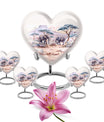 10-inch Heart-shaped Elephant Urn, featuring a butterfly theme, includes personal engraving and velvet pouch