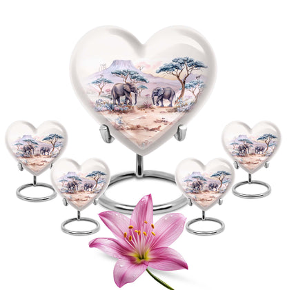 10-inch Heart-shaped Elephant Urn, featuring a butterfly theme, includes personal engraving and velvet pouch