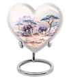 10-inch Heart-shaped Elephant Urn, featuring a butterfly theme, includes personal engraving and velvet pouch