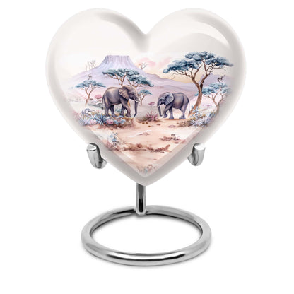 10-inch Heart-shaped Elephant Urn, featuring a butterfly theme, includes personal engraving and velvet pouch