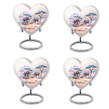10-inch Heart-shaped Elephant Urn, featuring a butterfly theme, includes personal engraving and velvet pouch