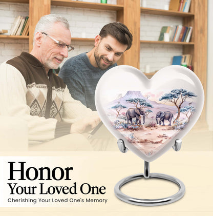 10-inch Heart-shaped Elephant Urn, featuring a butterfly theme, includes personal engraving and velvet pouch