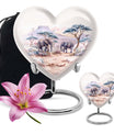 10-inch Heart-shaped Elephant Urn, featuring a butterfly theme, includes personal engraving and velvet pouch