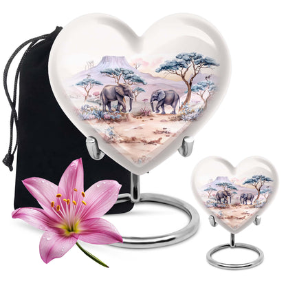 10-inch Heart-shaped Elephant Urn, featuring a butterfly theme, includes personal engraving and velvet pouch