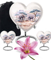 10-inch Heart-shaped Elephant Urn, featuring a butterfly theme, includes personal engraving and velvet pouch
