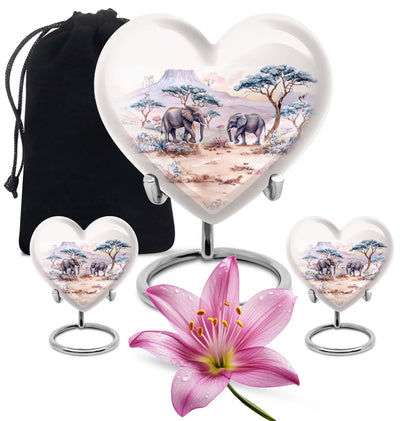 10-inch Heart-shaped Elephant Urn, featuring a butterfly theme, includes personal engraving and velvet pouch