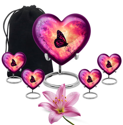 Soft Pink Butterfly Cremation Urn close-up of engraving and surface detail - romantic heart urn with butterfly motif on aluminum - memorial set with one large and four small urns