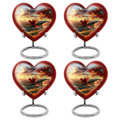 Matte Gold Cardinal Cremation Urn angled view of lid and engraved motif - compassionate heart-cardinal combination with gentle curves - 10 inch aluminum urn for cremated remains