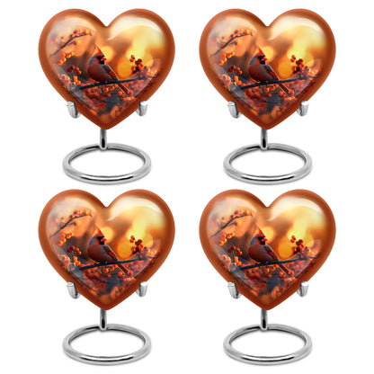 Amber Gold Cardinal Cremation Urn angled view of lid and engraved motif - heart-shaped cardinal design symbolizing eternal love - 10 inch aluminum urn for cremated remains