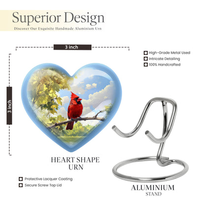 Indigo Cardinal Cremation Urn front view showing detailed design - heart-shaped cardinal design symbolizing eternal love - mini keepsake memorial for portion of cremation ashes