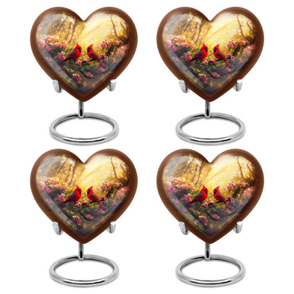 Matte Gold Cardinal Cremation Urn angled view of lid and engraved motif - compassionate heart-cardinal combination with gentle curves - 10 inch aluminum urn for cremated remains