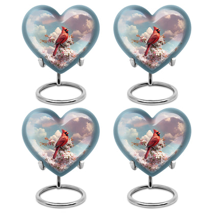 Pastel Blue Cardinal Cremation Urn angled view of lid and engraved motif - heart-shaped cardinal design symbolizing eternal love - 10 inch aluminum urn for cremated remains