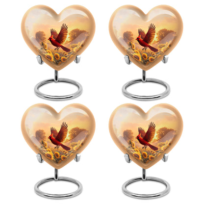 Amber Gold Cardinal Cremation Urn angled view of lid and engraved motif - heart-shaped cardinal design symbolizing eternal love - 10 inch aluminum urn for cremated remains