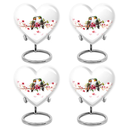 Moonlight Silver Hummingbird Cremation Urn angled view of lid and engraved motif - compassionate heart-hummingbird combination with gentle curves - 10 inch aluminum urn for cremated remains