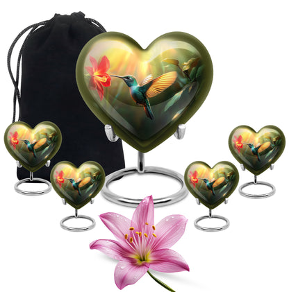 Antique Gold Hummingbird Cremation Urn close-up of engraving and surface detail - heart-shaped hummingbird design symbolizing eternal love - memorial set with one large and four small urns