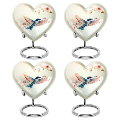 Snow White Hummingbird Cremation Urn angled view of lid and engraved motif - heart-shaped hummingbird design symbolizing eternal love - 10 inch aluminum urn for cremated remains