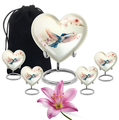 Frost White Hummingbird Cremation Urn close-up of engraving and surface detail - loving heart memorial featuring hummingbird pattern - memorial set with one large and four small urns