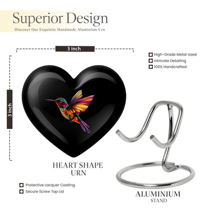 Midnight Black Hummingbird Cremation Urn front view showing detailed design - compassionate heart-hummingbird combination with gentle curves - mini keepsake memorial for portion of cremation ashes