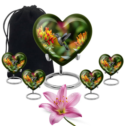 Soft Yellow Hummingbird Cremation Urn close-up of engraving and surface detail - romantic heart urn with hummingbird motif on aluminum - memorial set with one large and four small urns