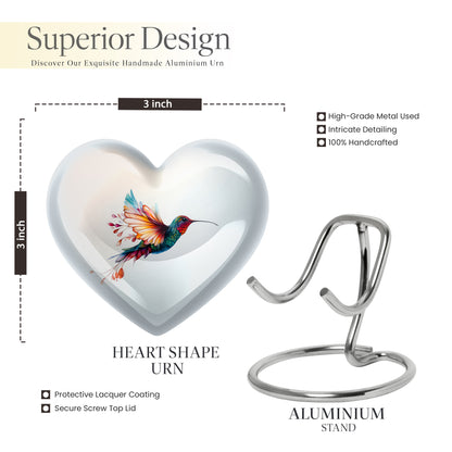 Chrome Silver Hummingbird Cremation Urn front view showing detailed design - compassionate heart-hummingbird combination with gentle curves - mini keepsake memorial for portion of cremation ashes
