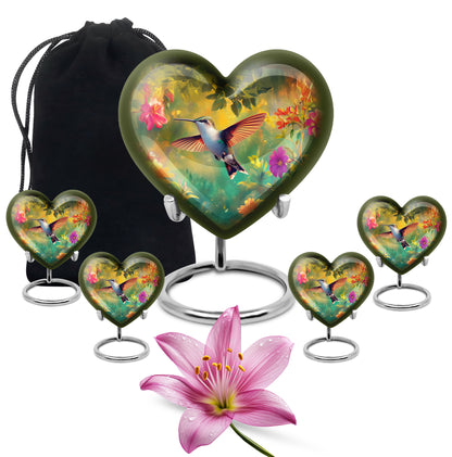 Midnight Black Hummingbird Cremation Urn close-up of engraving and surface detail - romantic heart urn with hummingbird motif on aluminum - memorial set with one large and four small urns