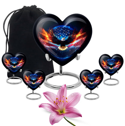 Jet Black Eagle Cremation Urn close-up of engraving and surface detail - heart-shaped eagle design symbolizing eternal love - memorial set with one large and four small urns