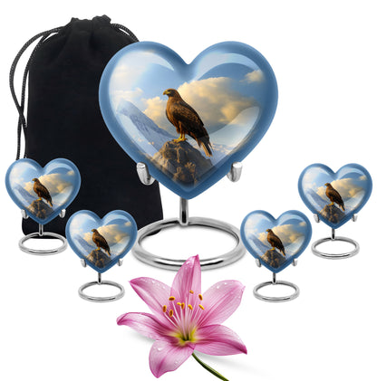 Cornflower Blue Eagle Cremation Urn close-up of engraving and surface detail - romantic heart urn with eagle motif on aluminum - memorial set with one large and four small urns