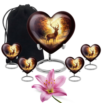 Ruby Red Deer Cremation Urn close-up of engraving and surface detail - romantic heart urn with deer motif on aluminum - memorial set with one large and four small urns