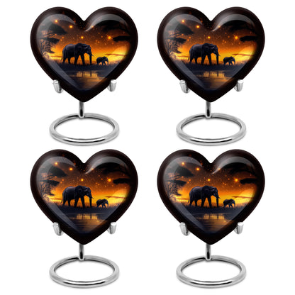 Deep Black Elephant Cremation Urn angled view of lid and engraved motif - loving heart memorial featuring elephant pattern - 10 inch aluminum urn for cremated remains