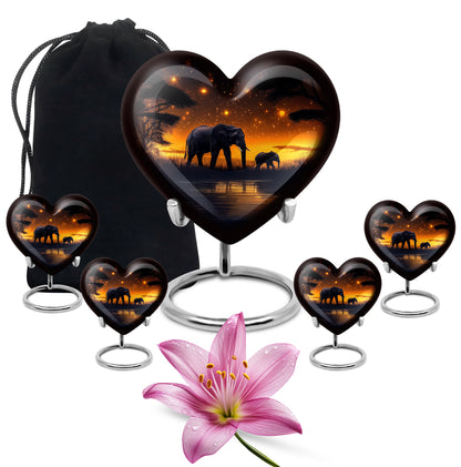 Deep Black Elephant Cremation Urn close-up of engraving and surface detail - loving heart memorial featuring elephant pattern - memorial set with one large and four small urns