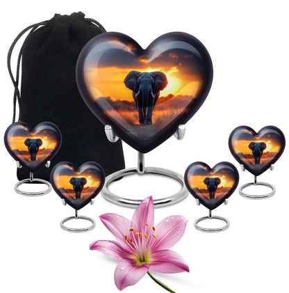 Pastel Blue Elephant Cremation Urn close-up of engraving and surface detail - heart-shaped elephant design symbolizing eternal love - memorial set with one large and four small urns